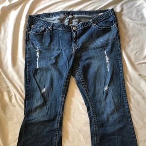 Dark blue distressed jeans